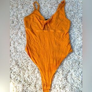 Orange bodysuit